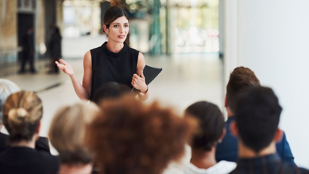 woman speaking to a group