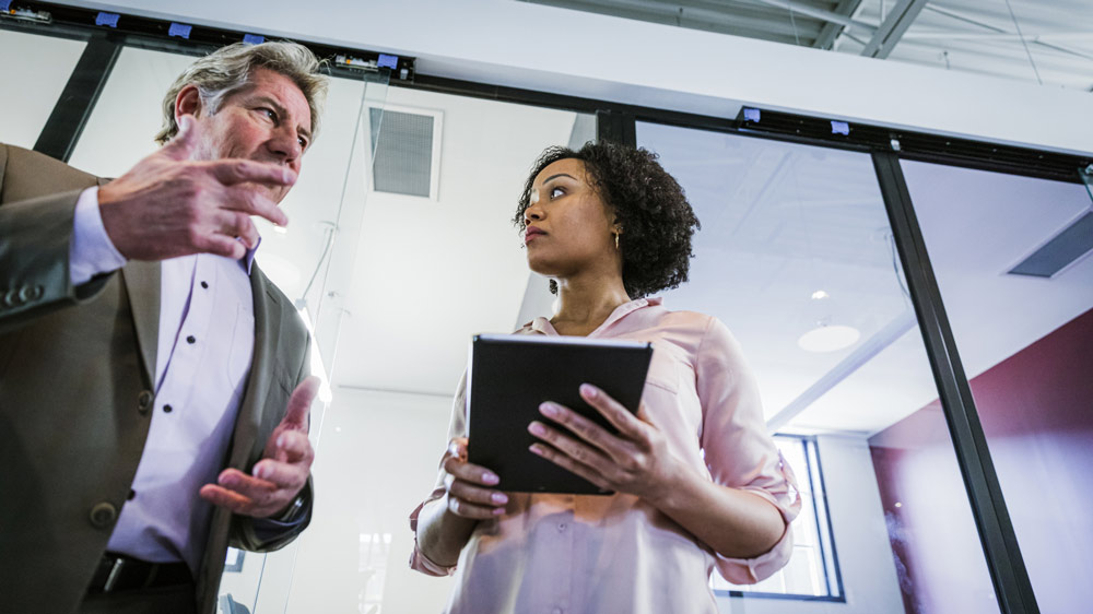 senior executive having a talk with a younger employee