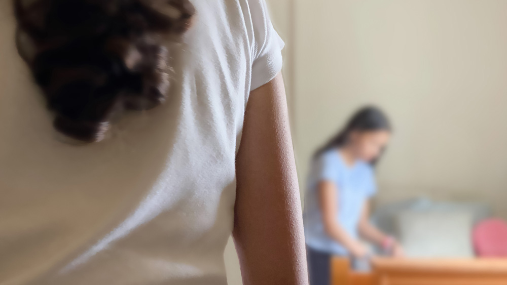 a young woman about to confront her roommate