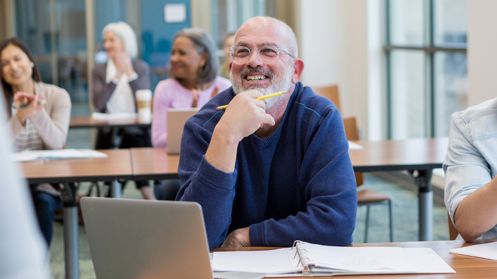 older gentleman engaged in classroom training