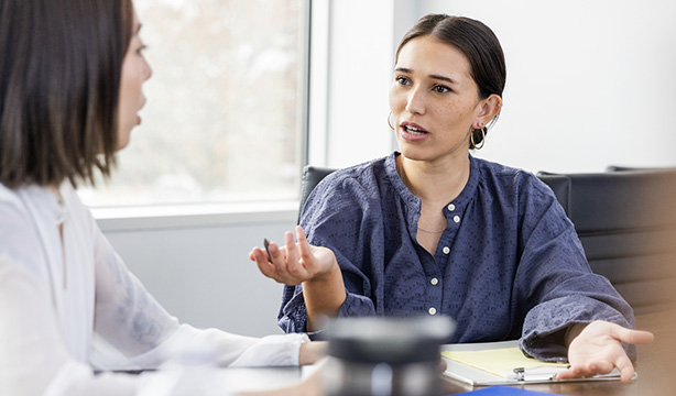 two women having an accountability conversation