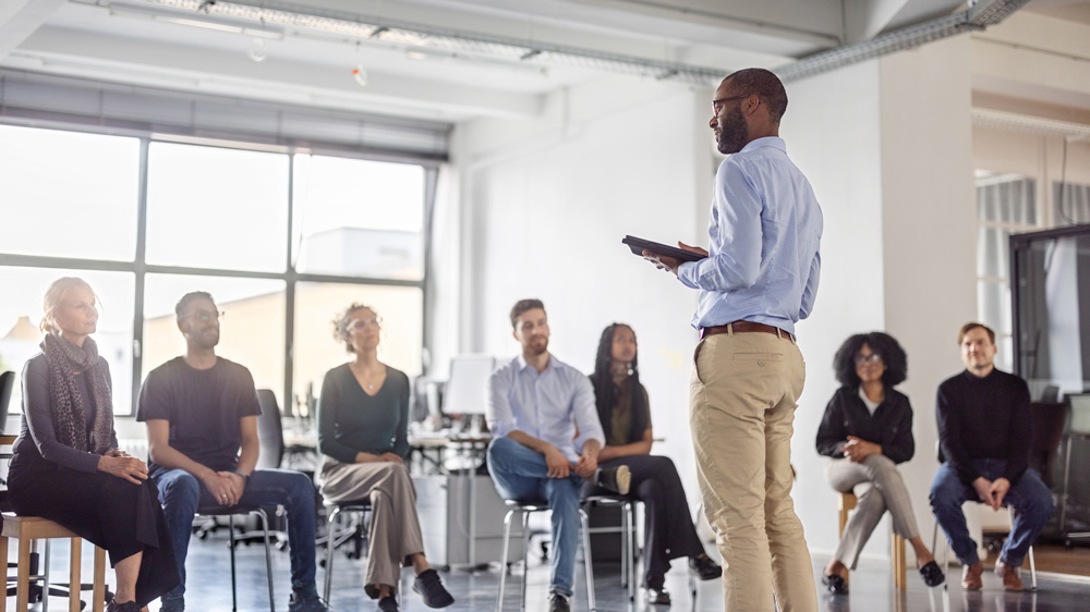 man leading a corporate training