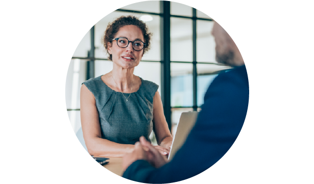 Professional woman speaking with a man